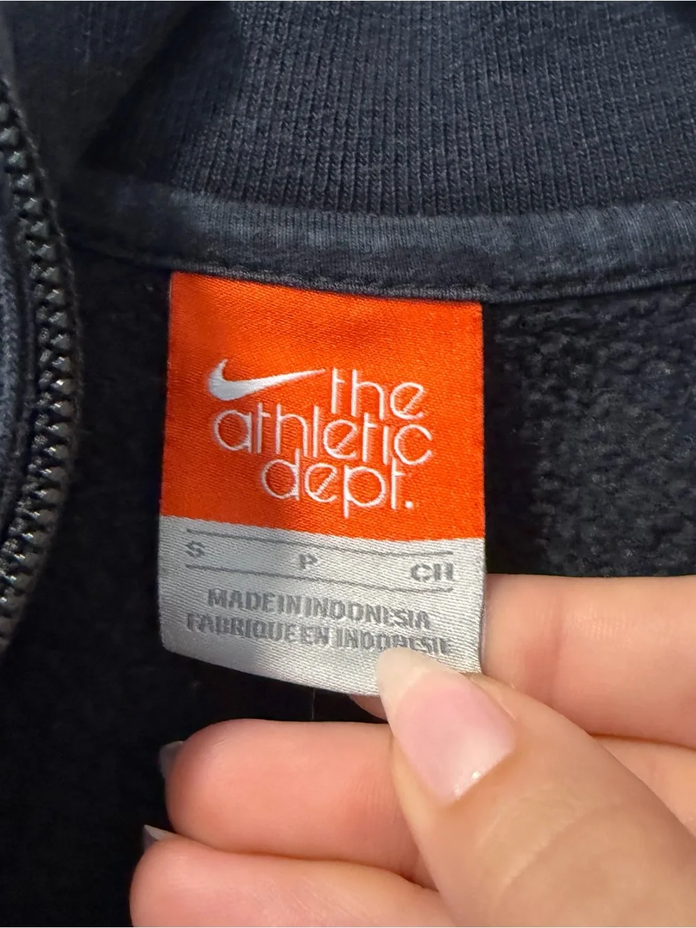 Nike Black Fleece Jacket with Orange Tag and White Swoosh